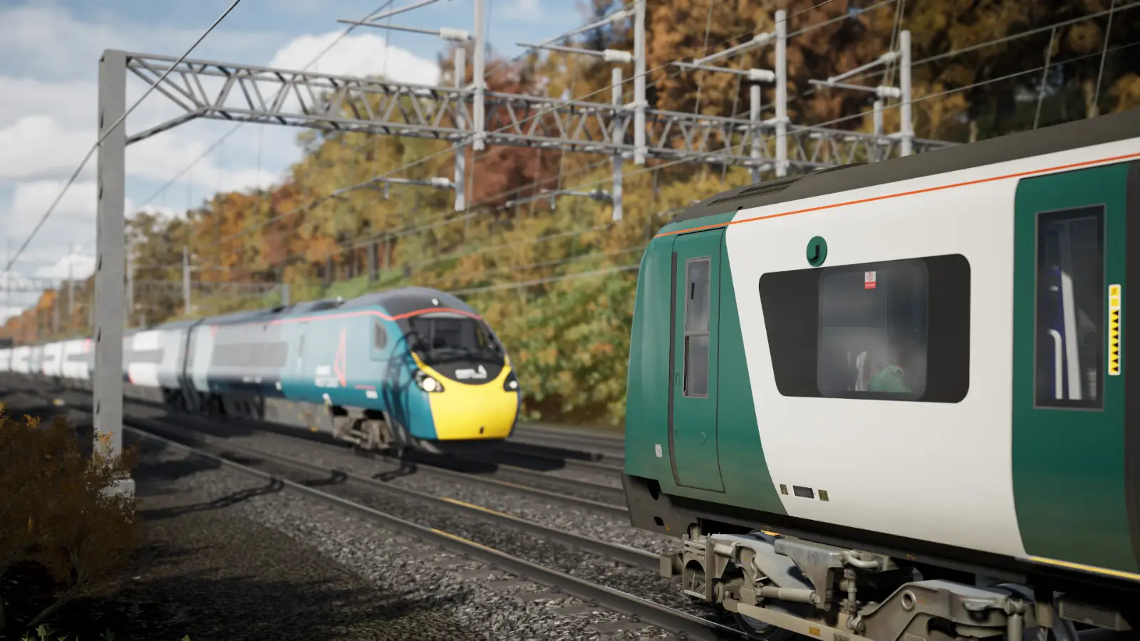 In the foreground, a Class 350 passes a Class 390 on the track behind it.