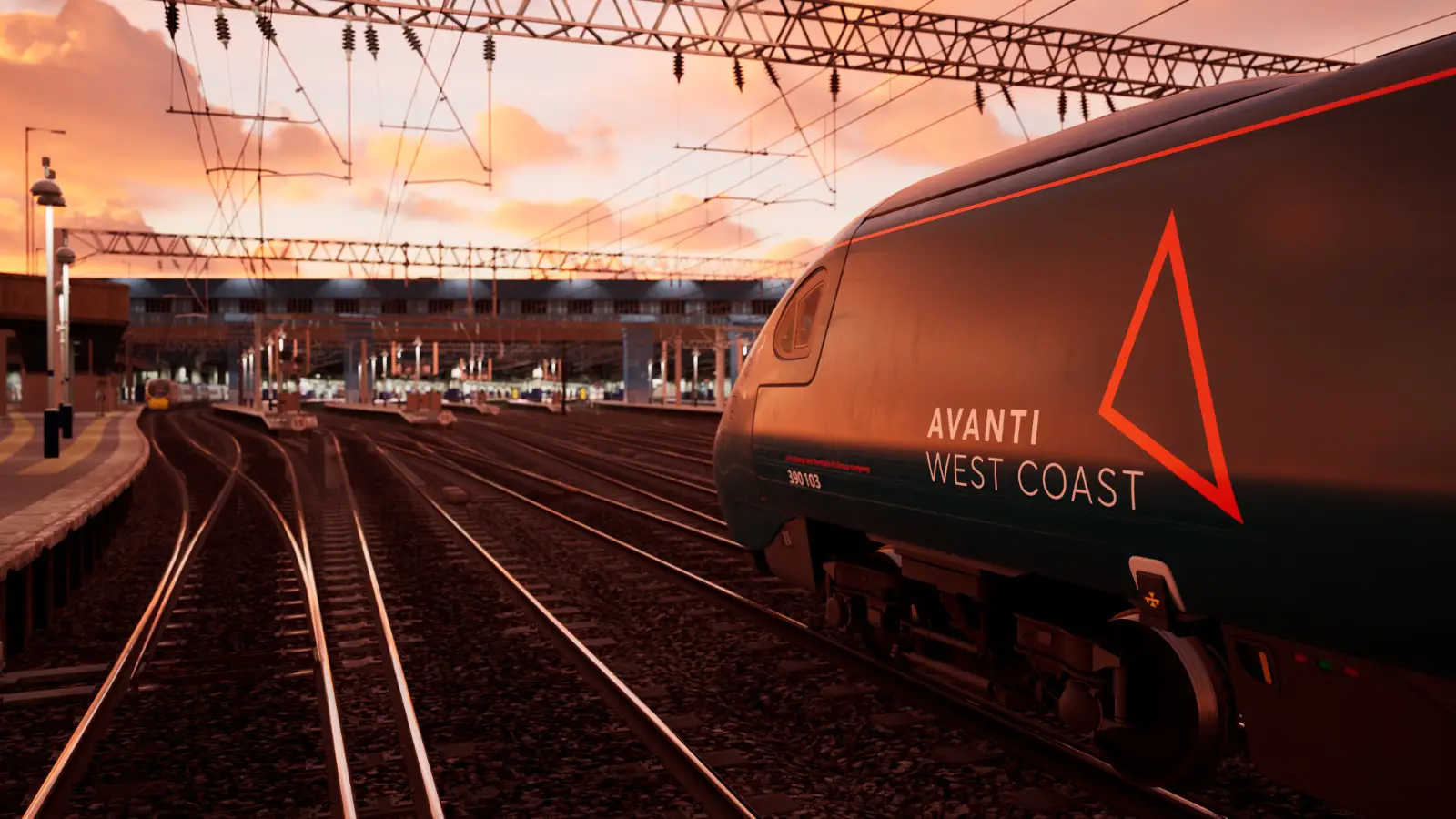 A Class 390 Pendolino approaches the many platforms of London Euston station as the sun sets on a cloudy day.