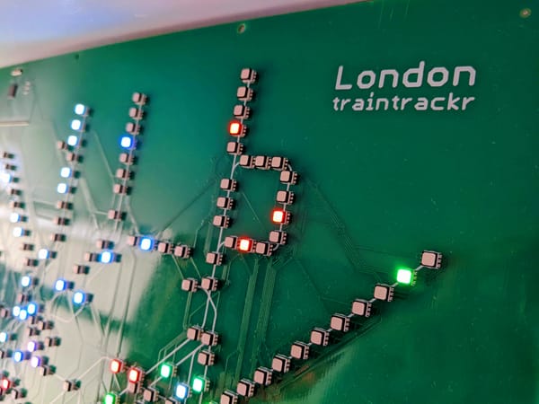 LED modules are positioned on a green circuitboard that light up with the colour of the London Underground line when a